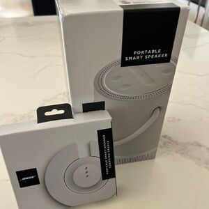 NEW/UNOPENED Bose Portable Smart Speaker + Charging Cradle Set